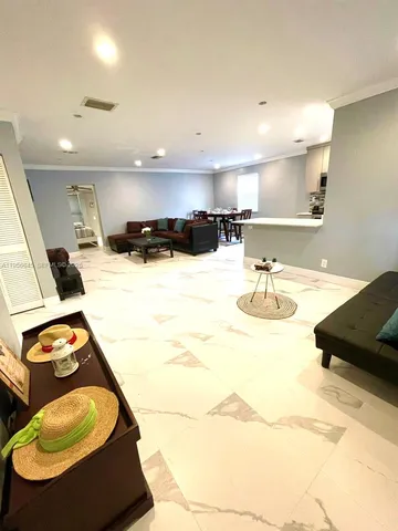 a bathroom with a sink mirror and vanity