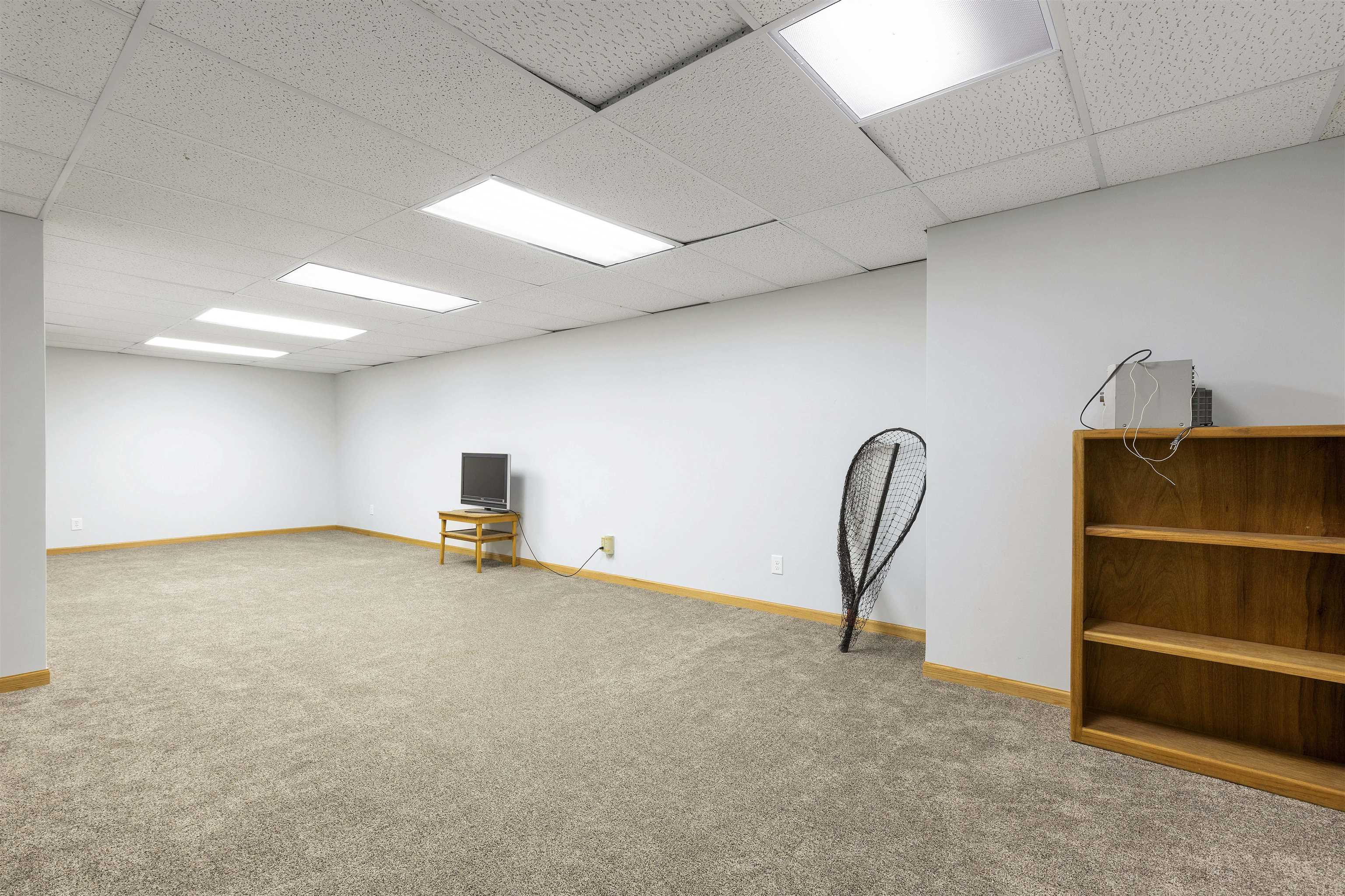 3410 Rotary Road Rockford, IL 61109 - Photo 33 of 65 a view of a livingroom with a furniture and a ceiling fan