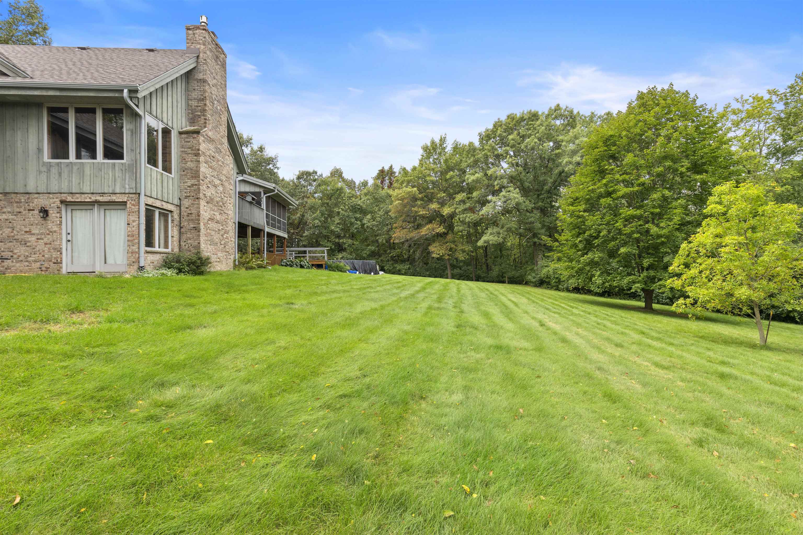 3410 Rotary Road Rockford, IL 61109 - Photo 43 of 65 a view of a house with a big yard