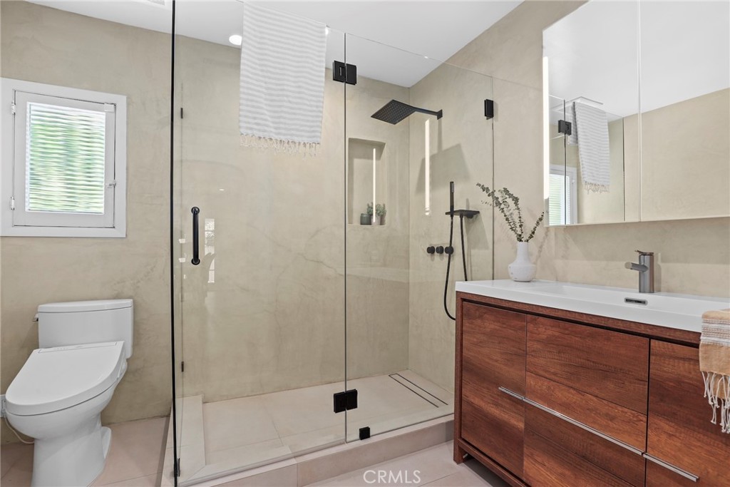 1445 Paloma Street Pasadena, CA 91104 - Photo 20 of 44 a bathroom with a shower a toilet and sink