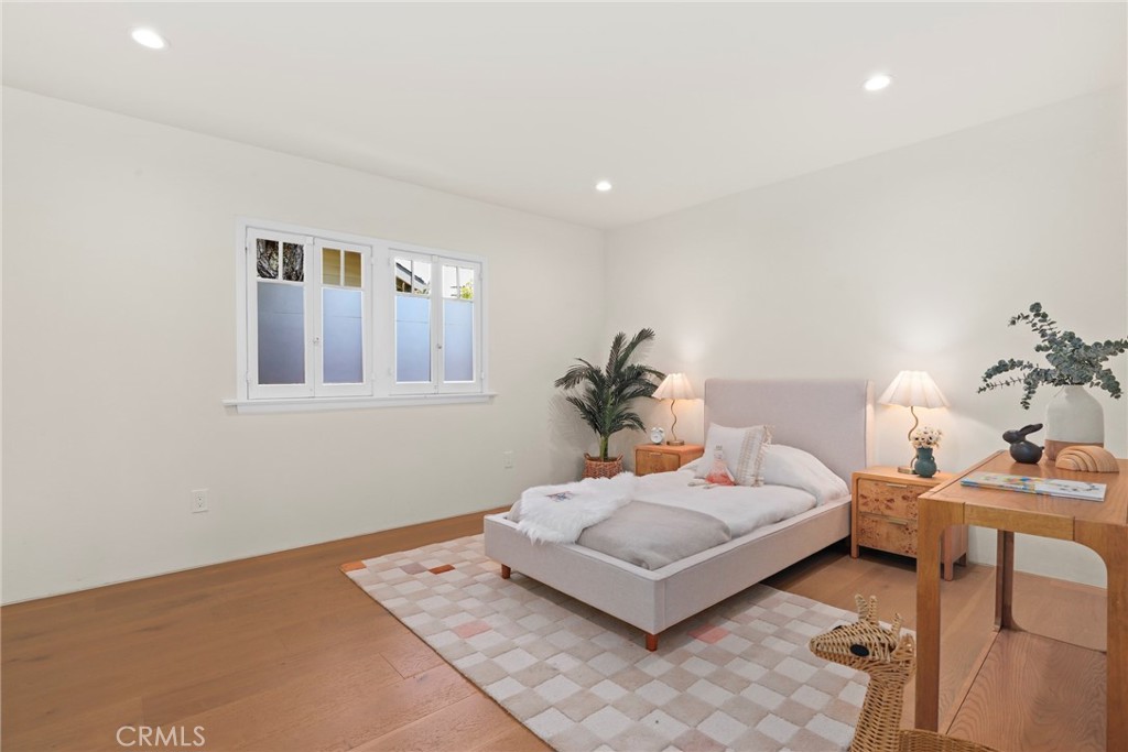 1445 Paloma Street Pasadena, CA 91104 - Photo 21 of 44 a living room with furniture and a lamp