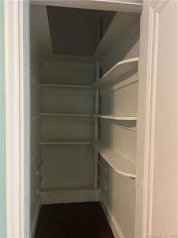 a empty closet with white paint