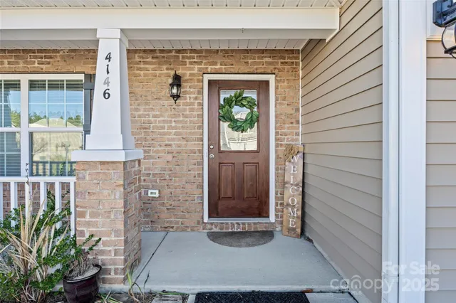 a view of a entryway door front of house