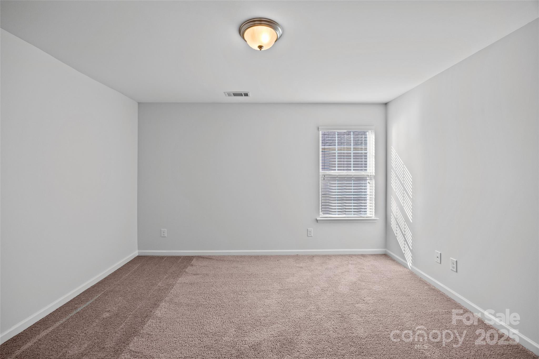 4146 Trowel Court Midland, NC 28107 - Photo 26 of 29 a view of empty room with a window