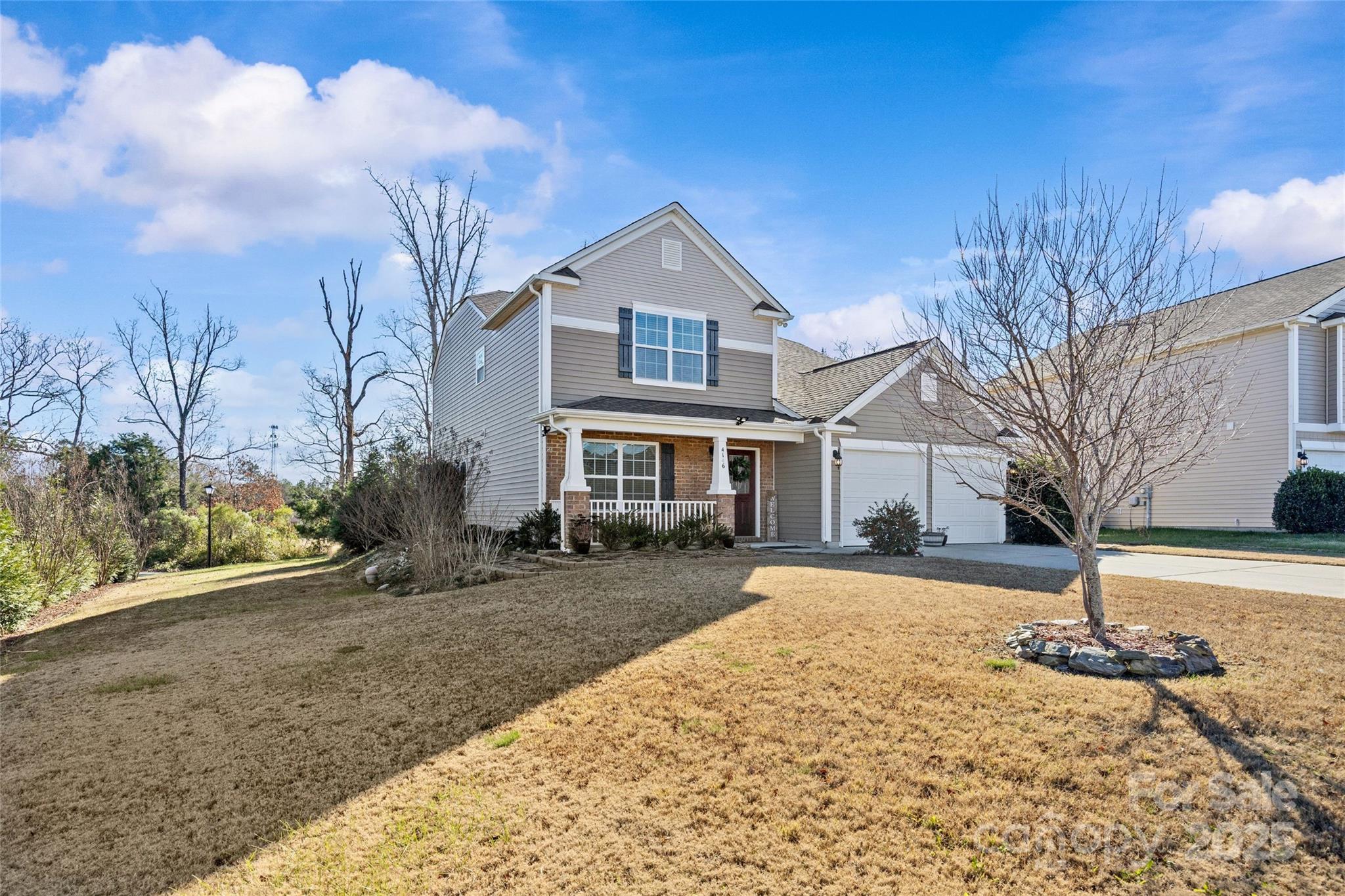 4146 Trowel Court Midland, NC 28107 - Photo 27 of 29 a front view of a house with a yard