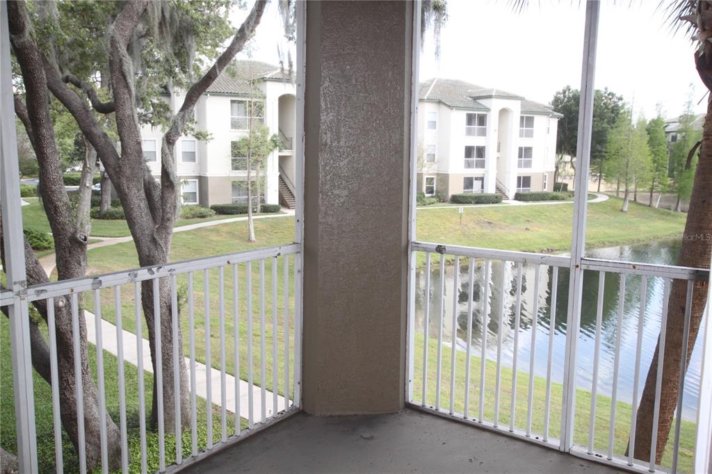 5811 Legacy Crescent Place, Unit 202 Riverview, FL 33578 - Photo 11 of 12 a view of balcony with outdoor space