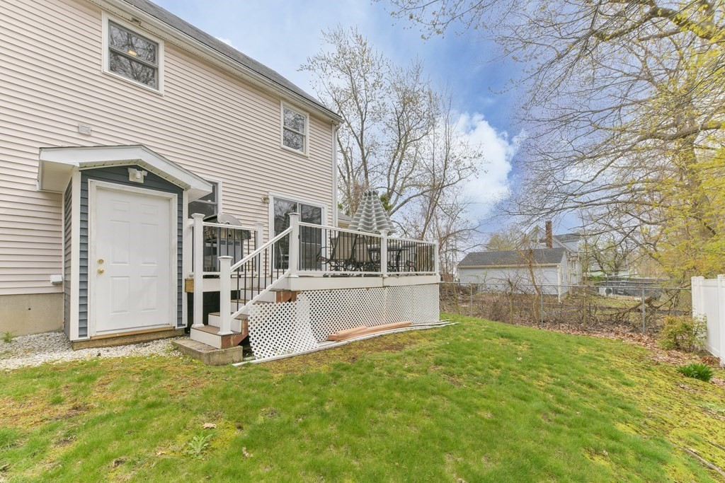 4 Scherig Circle, Unit 4 Methuen, MA 01844 - Photo 11 of 28 a view of a house with a yard