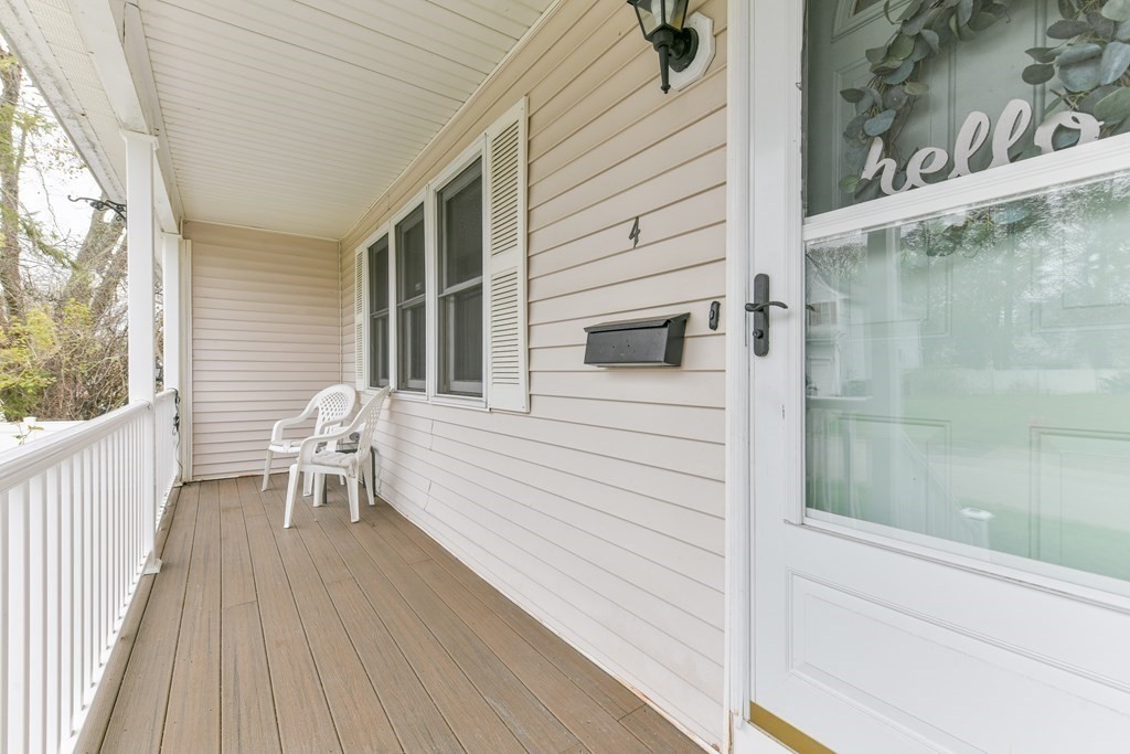 4 Scherig Circle, Unit 4 Methuen, MA 01844 - Photo 15 of 28 a balcony with a table and chairs