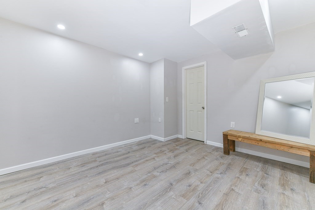 4 Scherig Circle, Unit 4 Methuen, MA 01844 - Photo 27 of 28 a view of room with wooden floor and bathroom