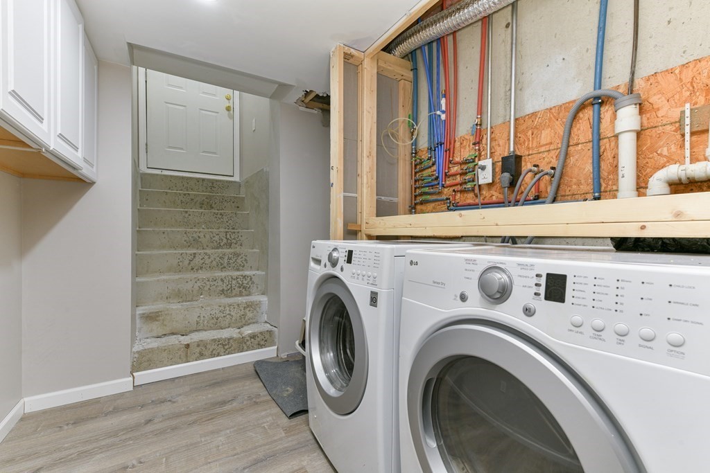 4 Scherig Circle, Unit 4 Methuen, MA 01844 - Photo 4 of 28 a view of bathroom with washer and dryer
