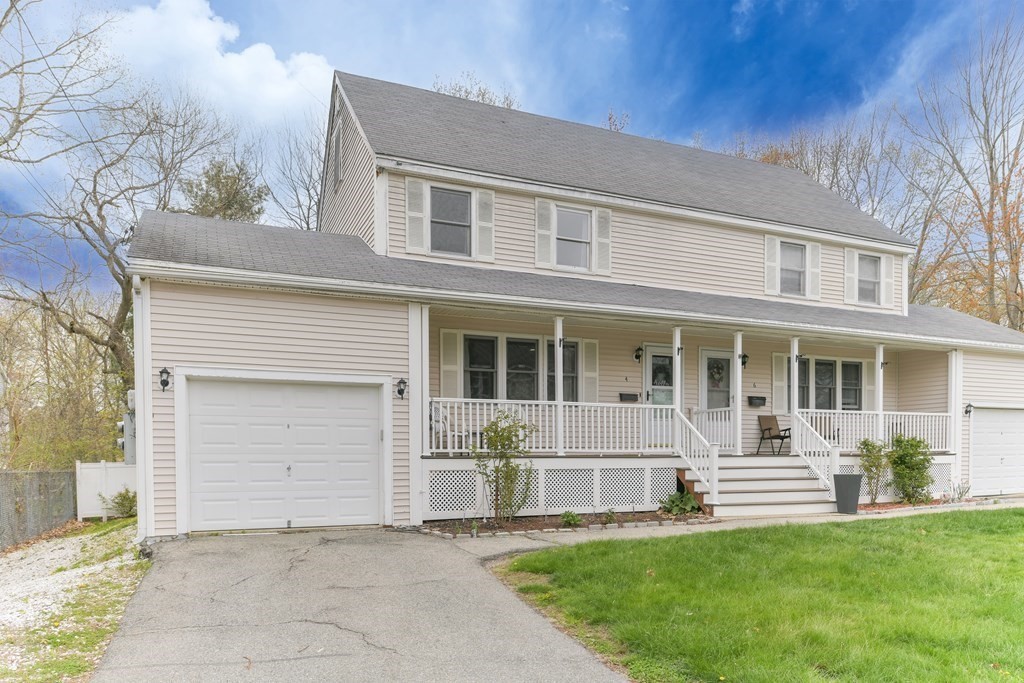 4 Scherig Circle, Unit 4 Methuen, MA 01844 - Photo 5 of 28 front view of a house with a garden