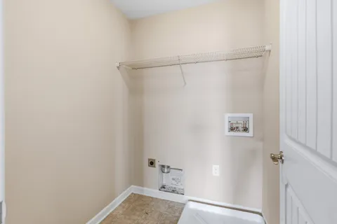 a bathroom with a shower and a sink