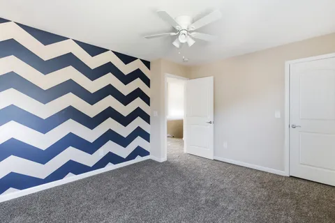 a view of a room with a front door