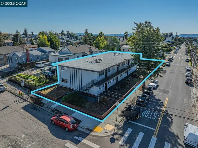 a terrace with outdoor seating and wooden floor