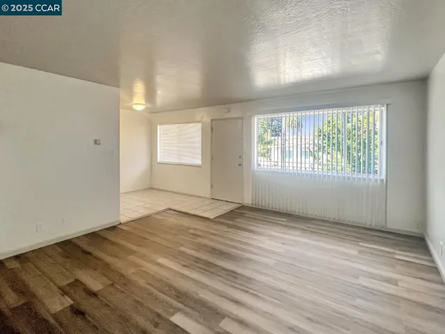 a kitchen that has a sink and a stove