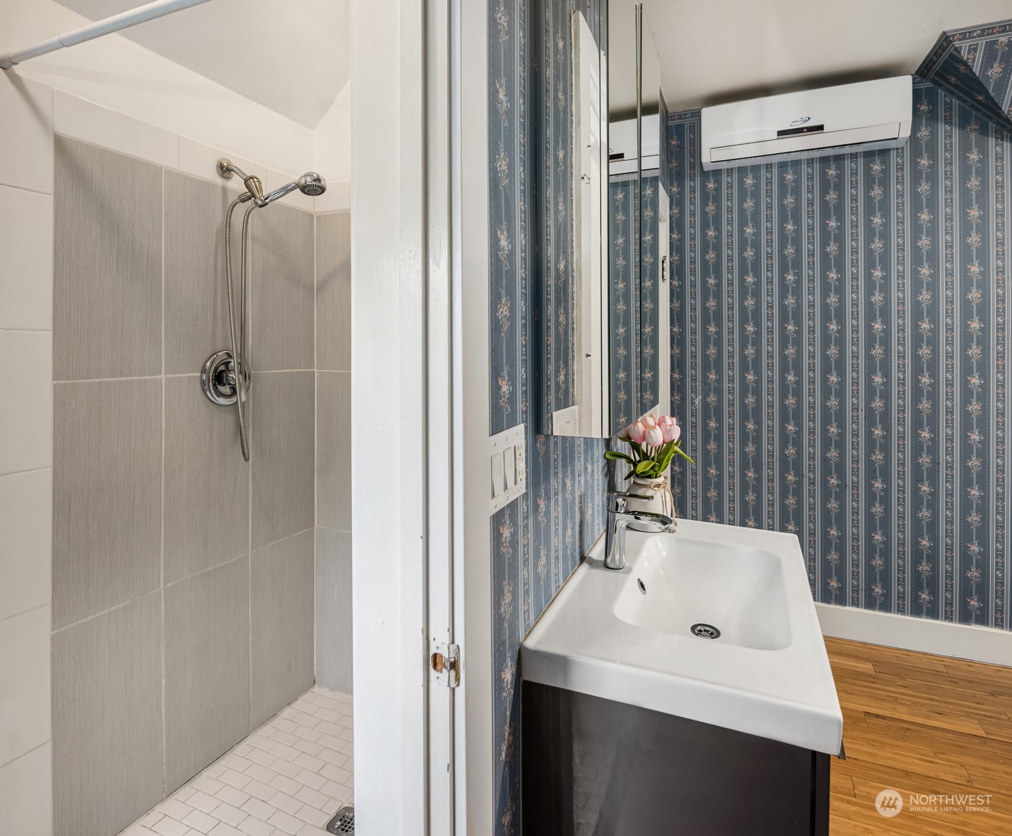537 Williams Avenue North Renton, WA 98057 - Photo 13 of 18 a bathroom with a sink and a mirror
