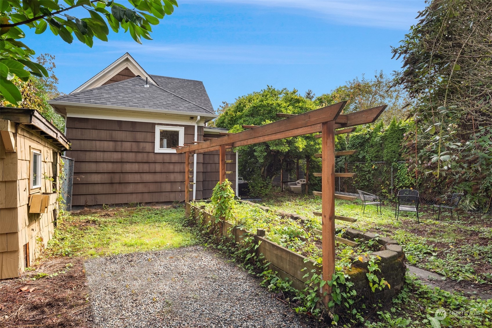 537 Williams Avenue North Renton, WA 98057 - Photo 16 of 18 a backyard of a house with plants and outdoor seating