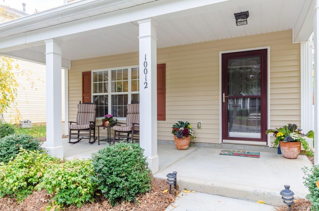 10012 Caldwell Depot Road Cornelius, NC 28031 - Photo 2 of 20 a view of a chair and table in a patio