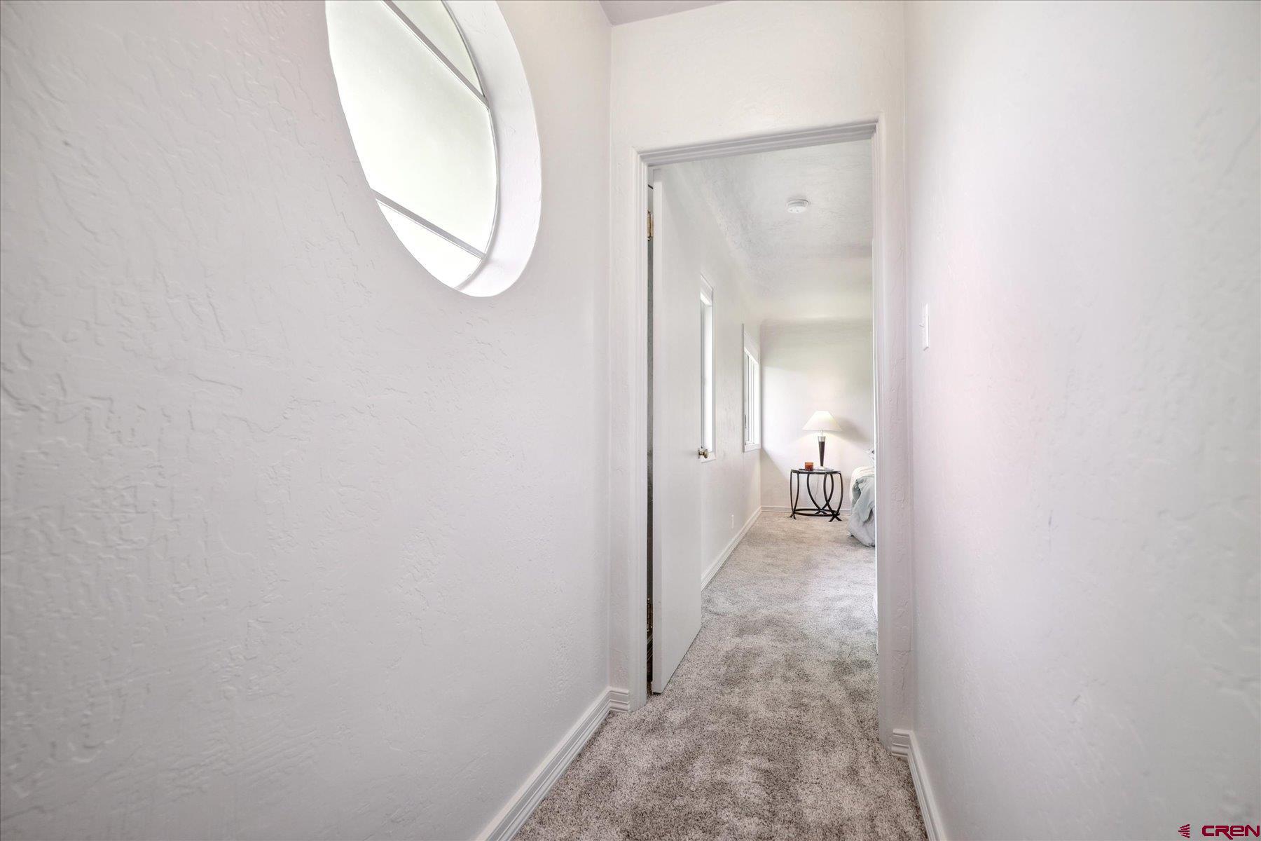 1200 North Dolores Road Cortez, CO 81321 - Photo 22 of 34 a view of a livingroom from a hallway