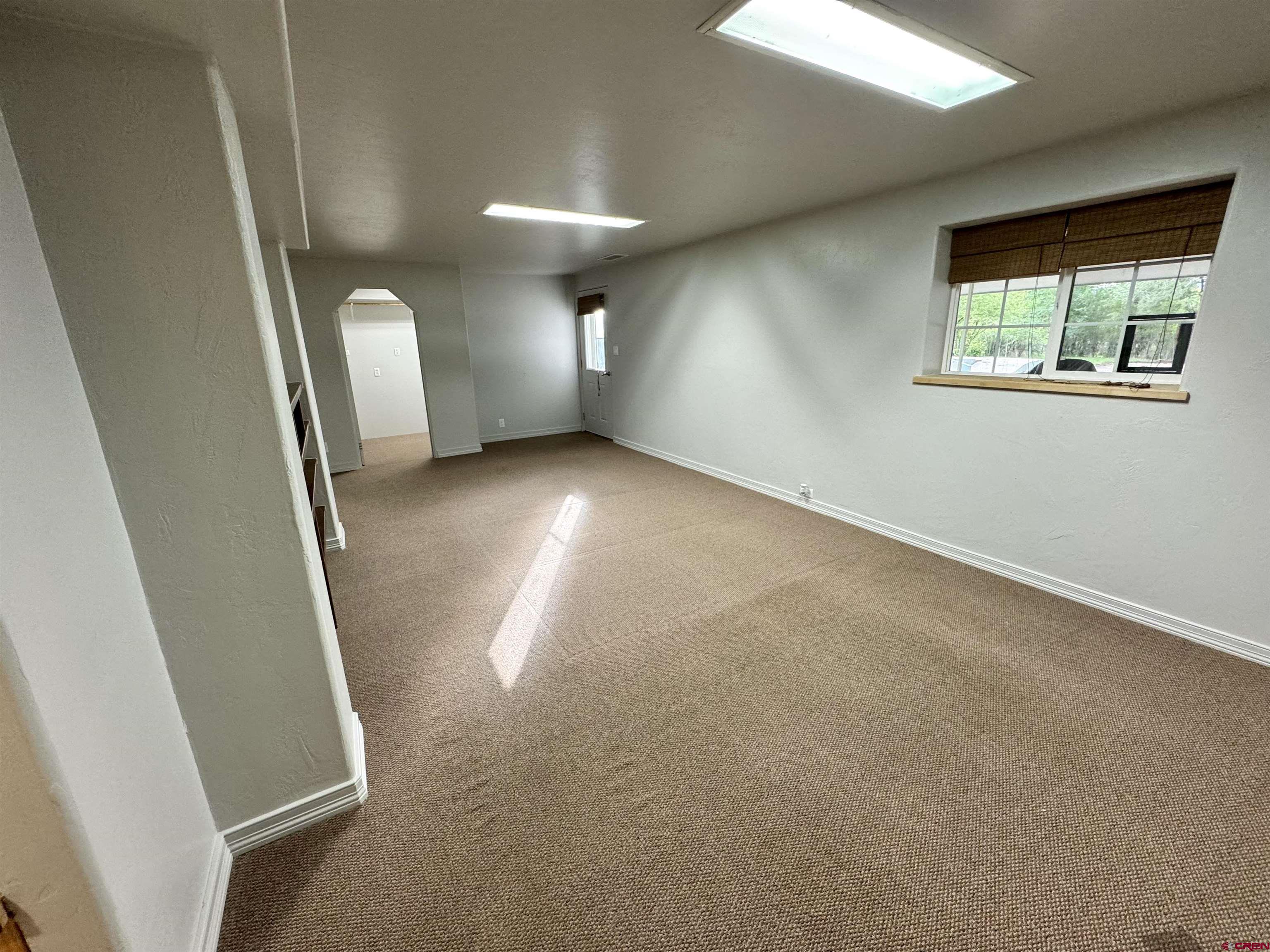 1200 North Dolores Road Cortez, CO 81321 - Photo 29 of 34 an empty room with windows
