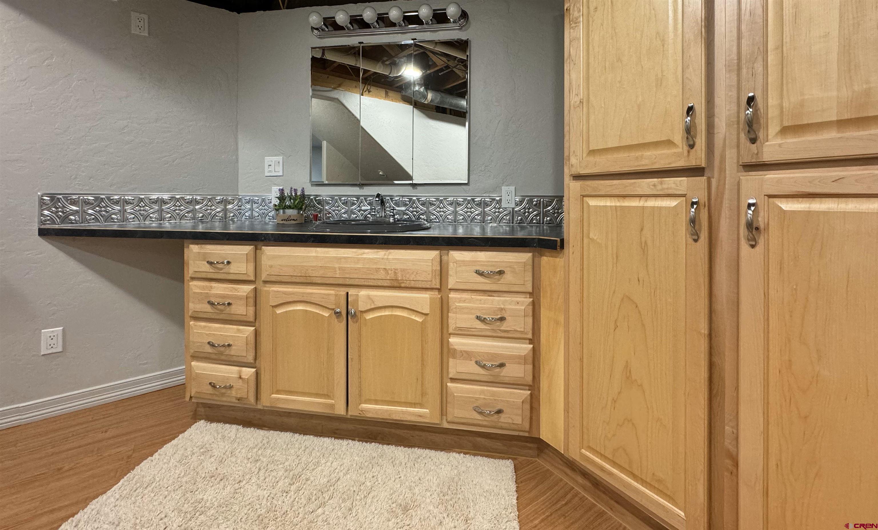 1200 North Dolores Road Cortez, CO 81321 - Photo 31 of 34 a view of a storage and utility room