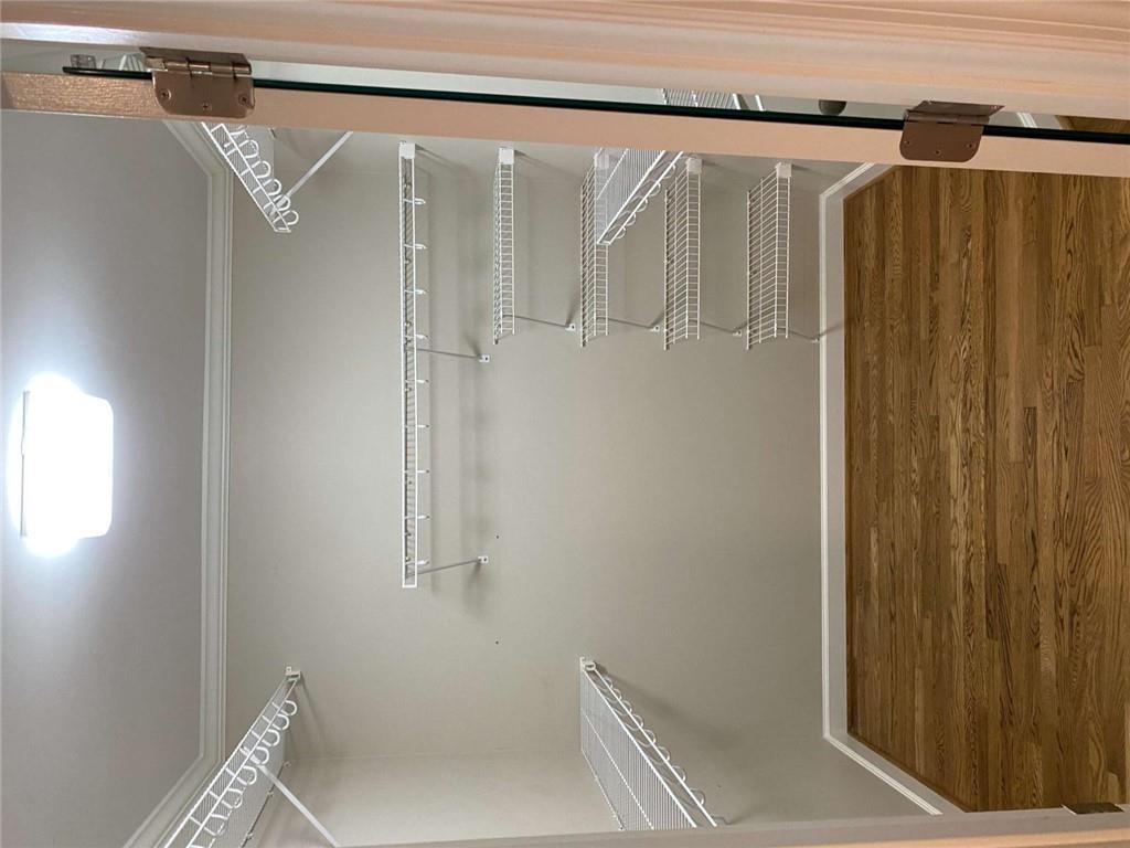 2021 Woodbine Terrace Northeast Atlanta, GA 30329 - Photo 11 of 24 a view of walk in closet with empty racks