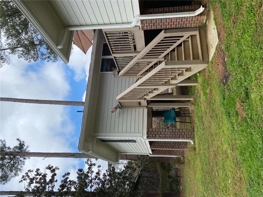 2021 Woodbine Terrace Northeast Atlanta, GA 30329 - Photo 21 of 24 a view of a house with a yard