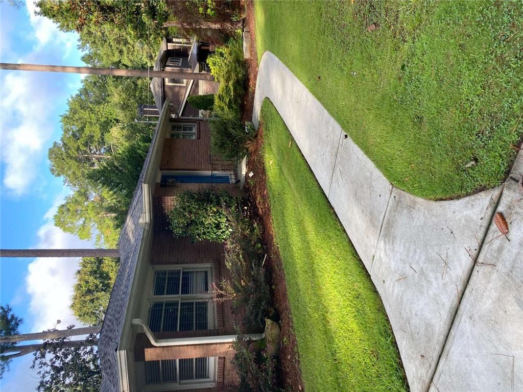 2021 Woodbine Terrace Northeast Atlanta, GA 30329 - Photo 24 of 24 a front view of a house with a yard