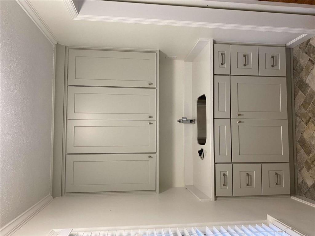 2021 Woodbine Terrace Northeast Atlanta, GA 30329 - Photo 9 of 24 a kitchen with white cabinets and white appliances