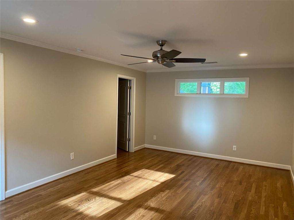 2021 Woodbine Terrace Northeast Atlanta, GA 30329 - Photo 10 of 24 a view of a big room with carpet and windows