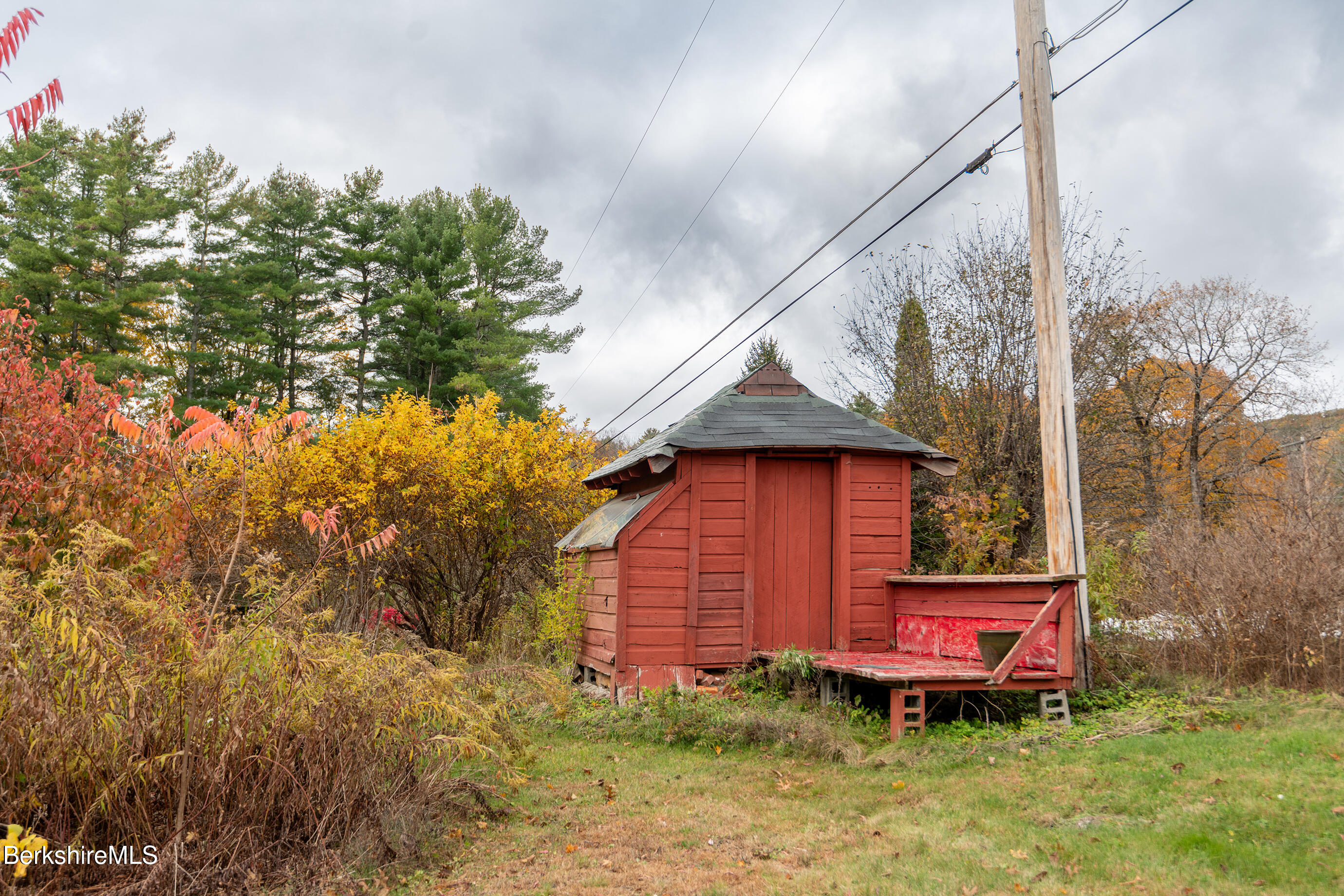2 Devon Road Stockbridge, MA 01262 - Photo 6 of 12 a front view of a house with a yard