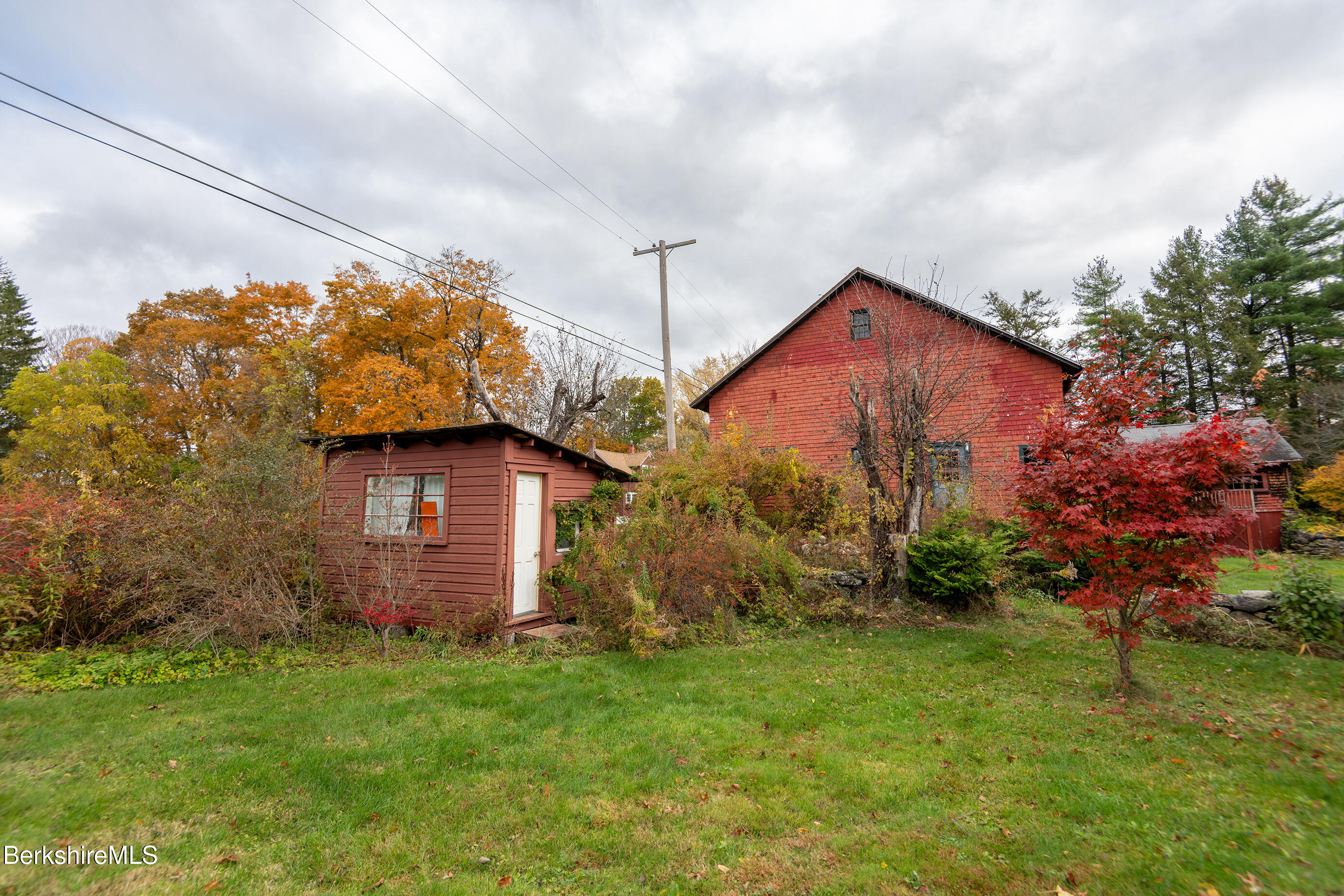 2 Devon Road Stockbridge, MA 01262 - Photo 7 of 12 a backyard of a house with lots of green space