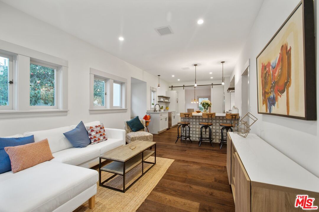 403 North Irving Boulevard Los Angeles, CA 90004 - Photo 25 of 46 a living room with furniture and a large window