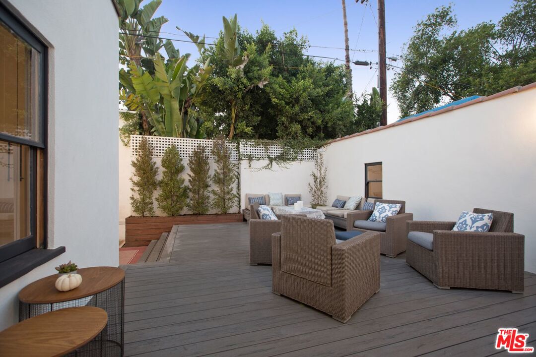 403 North Irving Boulevard Los Angeles, CA 90004 - Photo 32 of 46 a living room with furniture and wooden floor