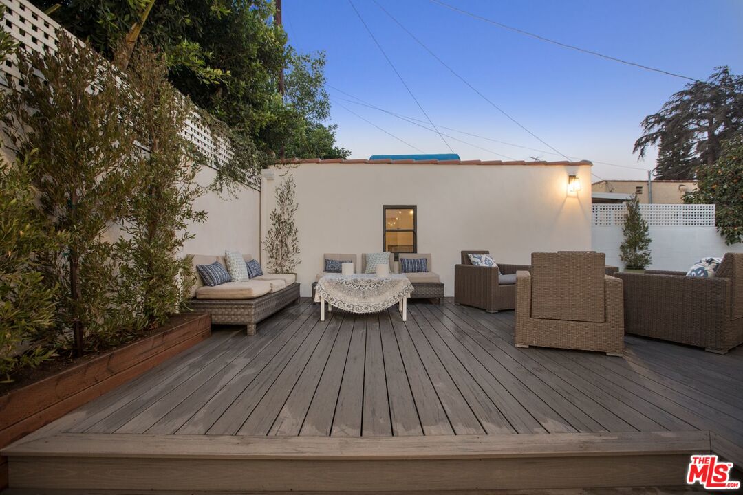 403 North Irving Boulevard Los Angeles, CA 90004 - Photo 35 of 46 a view of a patio with couches and potted plants