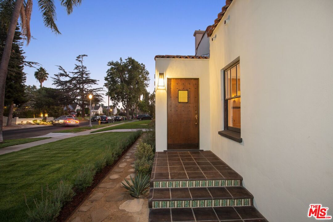 403 North Irving Boulevard Los Angeles, CA 90004 - Photo 39 of 46 a front view of a house with a yard