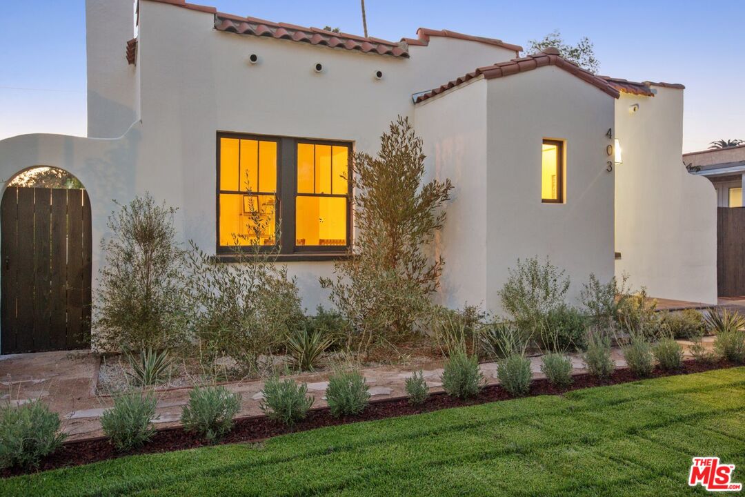 403 North Irving Boulevard Los Angeles, CA 90004 - Photo 42 of 46 a front view of house with yard