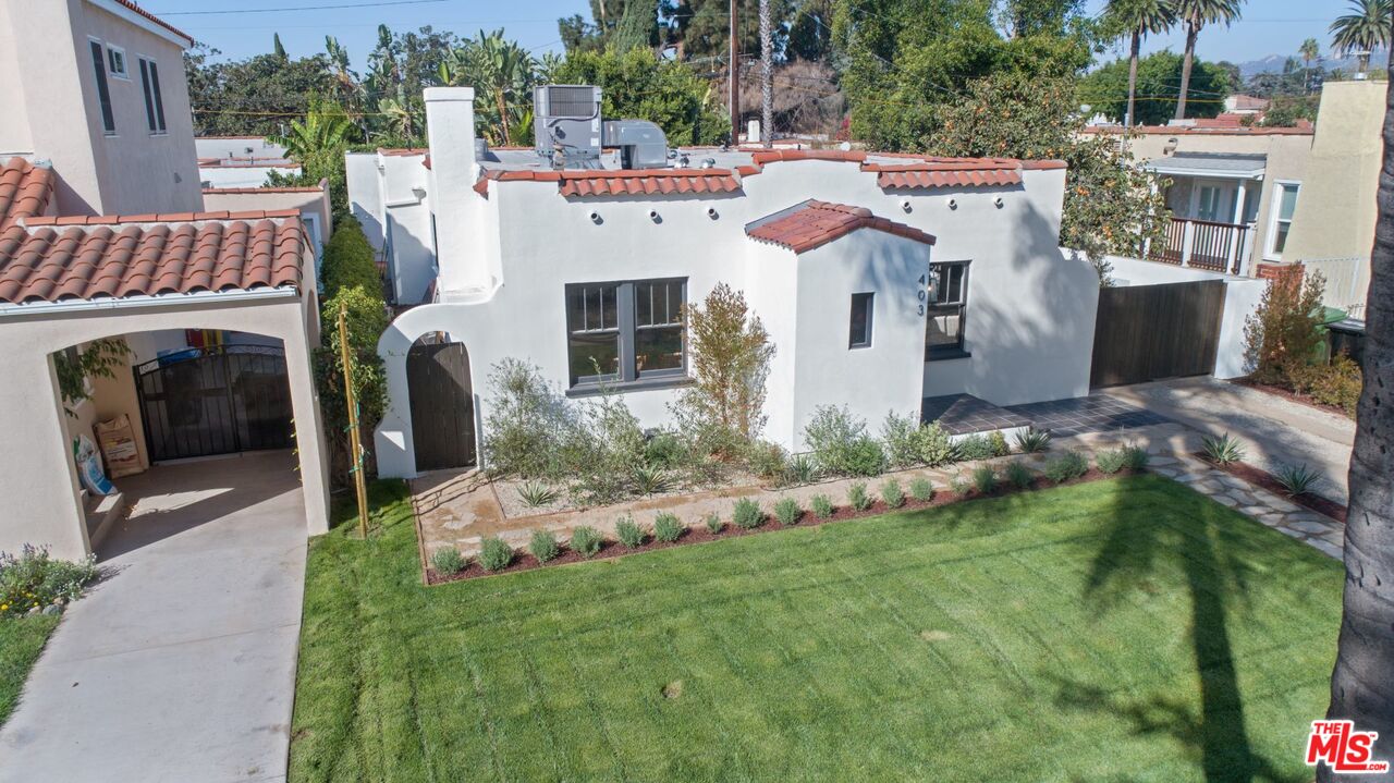 403 North Irving Boulevard Los Angeles, CA 90004 - Photo 45 of 46 a view of a house with backyard and furniture