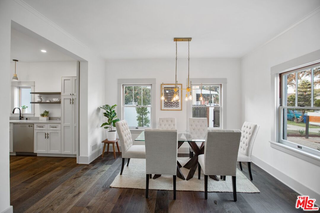 403 North Irving Boulevard Los Angeles, CA 90004 - Photo 8 of 46 a view of a dining room with furniture window and wooden floor
