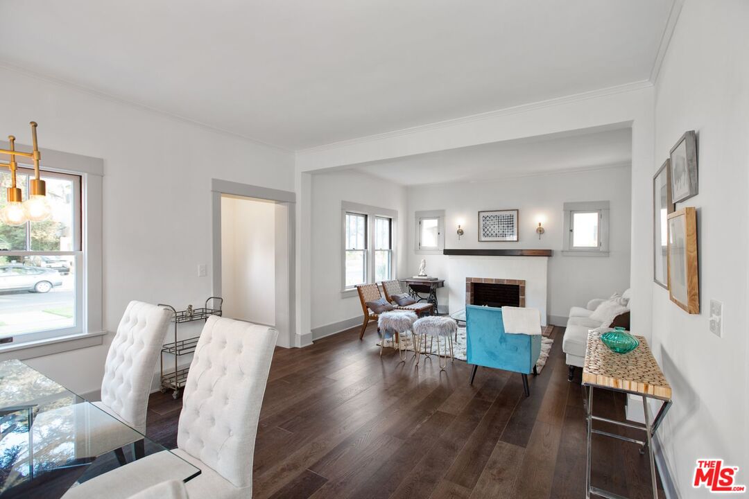 403 North Irving Boulevard Los Angeles, CA 90004 - Photo 9 of 46 a living room with furniture or fireplace and a wooden floor