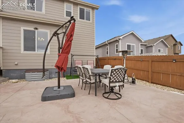 a view of a terrace with chairs