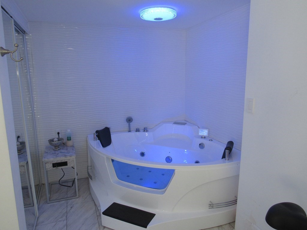 1-3 Walnut Street Methuen, MA 01844 - Photo 11 of 20 a bathroom with a tub and sink