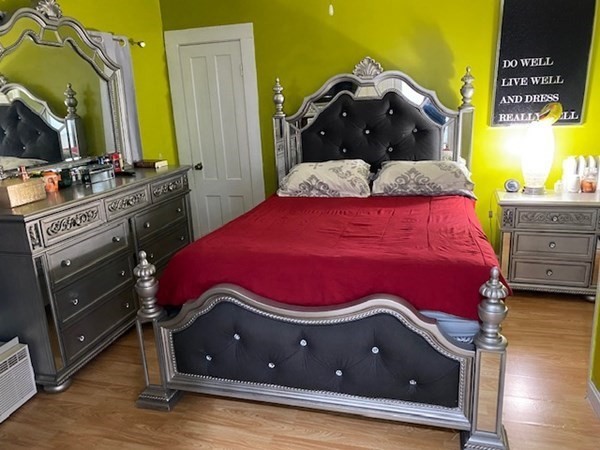 1-3 Walnut Street Methuen, MA 01844 - Photo 13 of 20 a bedroom with a bed and a dresser