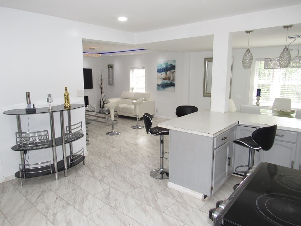 1-3 Walnut Street Methuen, MA 01844 - Photo 6 of 20 a living room with furniture and a large window