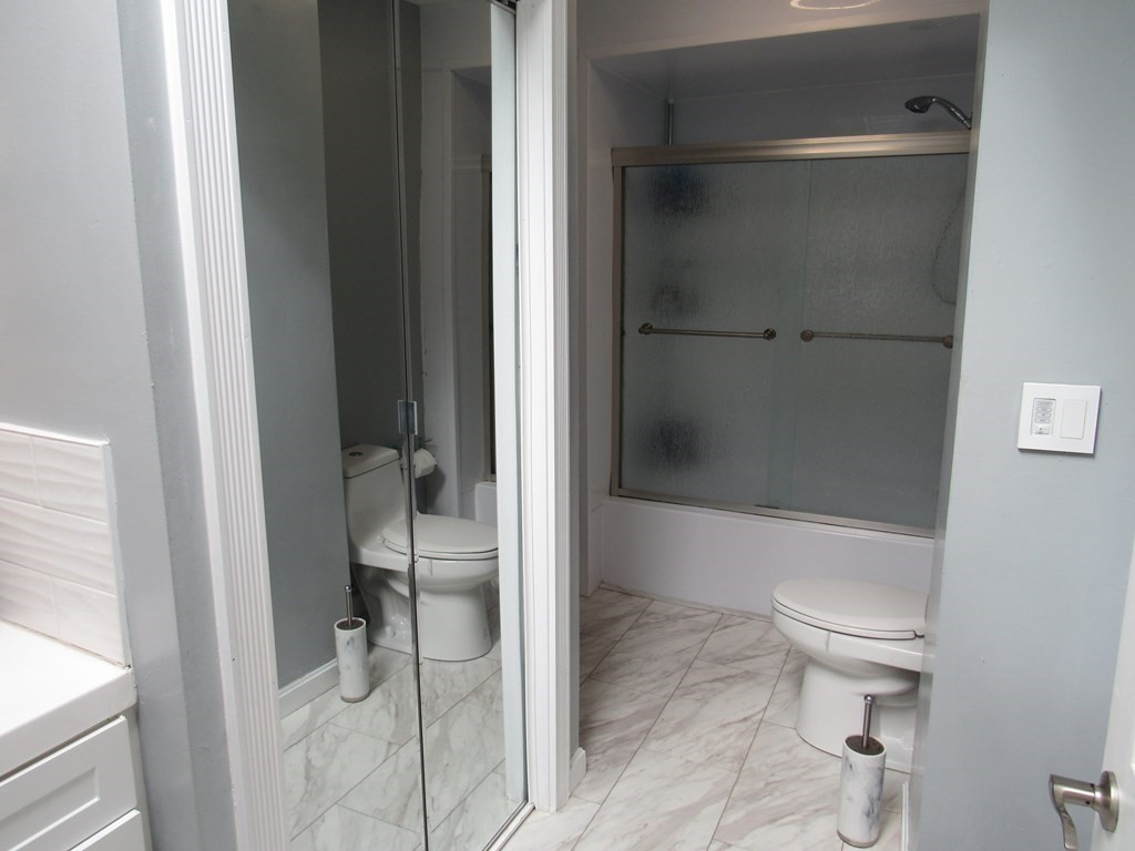 1-3 Walnut Street Methuen, MA 01844 - Photo 8 of 20 a bathroom with a toilet and a shower