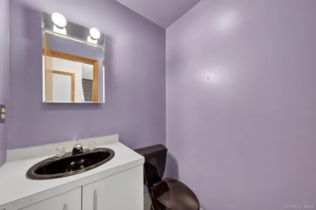 a view of a livingroom with furniture and a fireplace