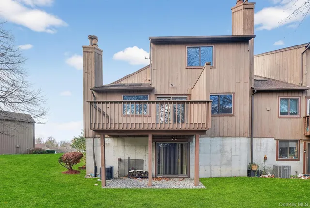 a view of a yard with large trees