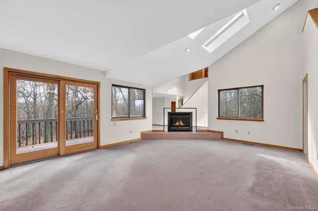 a kitchen with stainless steel appliances a white stove top oven and cabinets