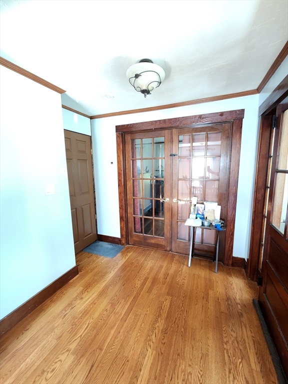 17 Davis Street Taunton, MA 02780 - Photo 11 of 26 a view of a livingroom with furniture and a floor to ceiling window