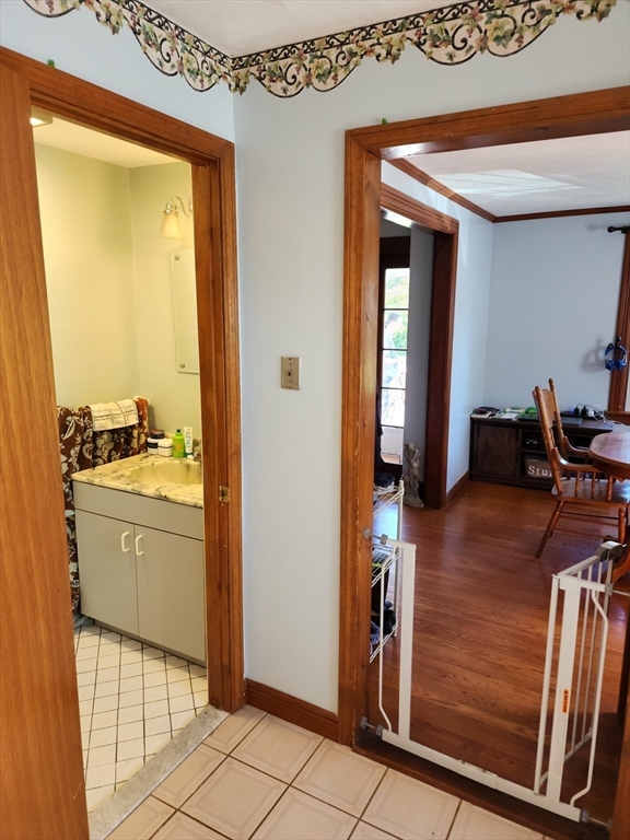17 Davis Street Taunton, MA 02780 - Photo 17 of 26 a bathroom with a sink a mirror and a shower